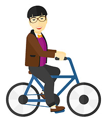 Image showing Man riding bicycle.