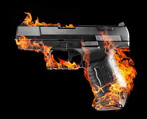 Image showing burning black pistol