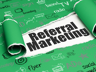 Image showing Marketing concept: black text Referral Marketing under the piece of  torn paper