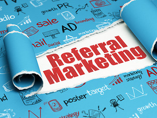Image showing Marketing concept: red text Referral Marketing under the piece of  torn paper