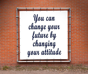 Image showing Large banner with inspirational quote on a brick wall