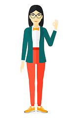 Image showing Woman gesturing OK sign. 
