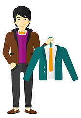 Image showing Man holding jacket.