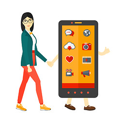 Image showing Woman walking with smartphone.