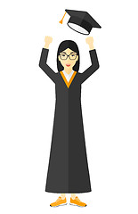 Image showing Graduate throwing up her hat.