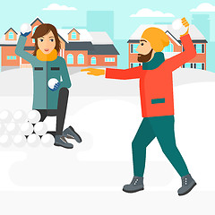 Image showing Couple playing in snowballs.