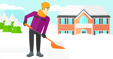 Image showing Man shoveling and removing snow.