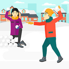 Image showing Couple playing in snowballs.