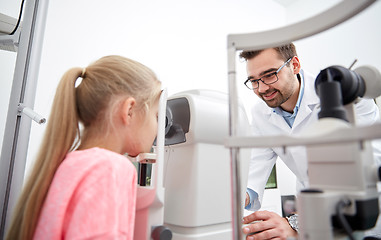 Image showing optician with tonometer and patient at eye clinic