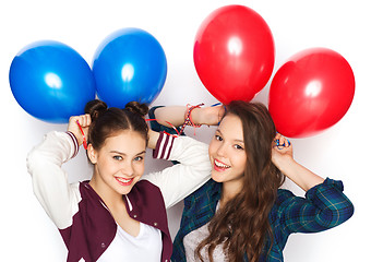 Image showing happy teenage girls with helium balloons