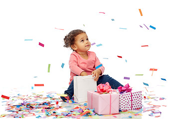 Image showing happy little baby girl with birthday presents