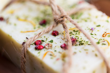 Image showing close up of handmade soap bars on wood