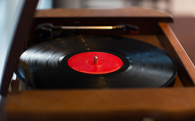 Image showing close up of vintage record player with vinyl disc