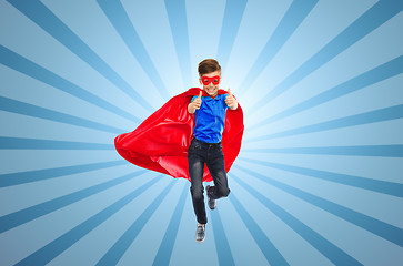 Image showing boy in super hero cape and mask showing thumbs up