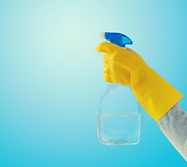 Image showing close up of hand with cleanser spraying