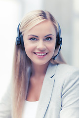 Image showing friendly female helpline operator