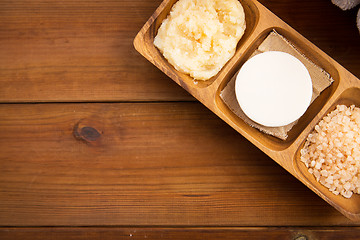 Image showing close up of soap, himalayan salt and body scrub