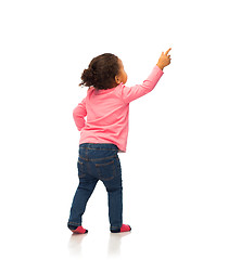 Image showing african baby girl pointing finger to something