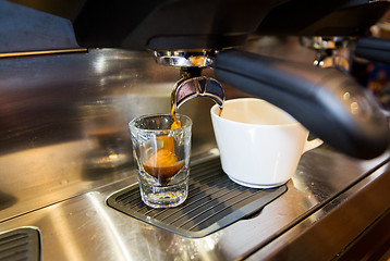 Image showing close up of espresso machine making coffee