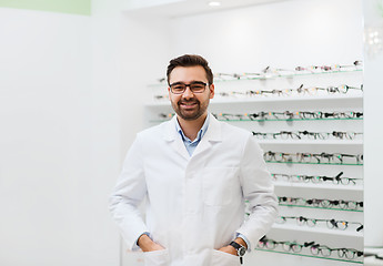 Image showing man optician in glasses and coat at optics store