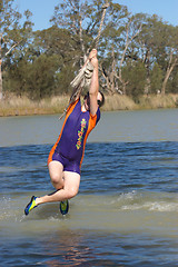 Image showing girl swinging