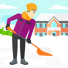 Image showing Man shoveling and removing snow.