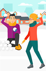 Image showing Couple playing in snowballs.