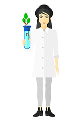 Image showing Laboratory assistant with test tube.