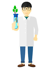 Image showing Laboratory assistant with test tube.