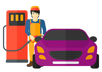 Image showing Man filling up fuel into car.