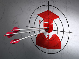 Image showing Education concept: arrows in Student target on wall background