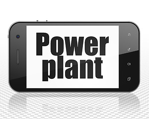 Image showing Manufacuring concept: Smartphone with Power Plant on display