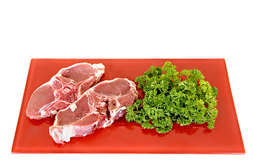 Image showing Lamb chops on red plate