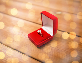 Image showing close up of gift box with diamond engagement ring