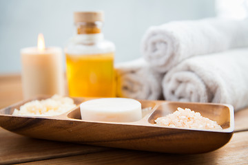 Image showing close up of soap, himalayan salt and scrub in bowl