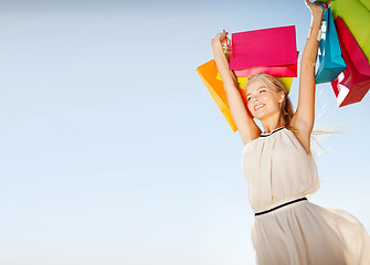 Image showing woman with shopping bags