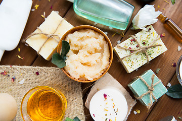 Image showing close up of body care cosmetic products on wood