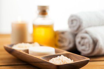 Image showing close up of soap, himalayan salt and scrub in bowl