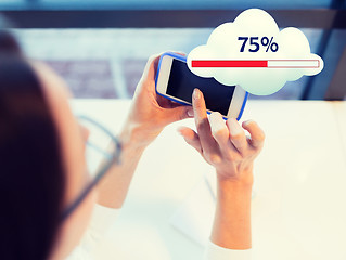 Image showing close up of woman with smartphone cloud computing