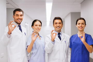 Image showing group of medics at hospital showing ok hand sign