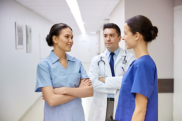 Image showing group of medics or doctors talking at hospital