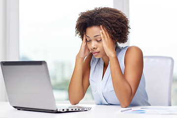 Image showing african woman with laptop at office