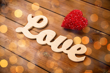 Image showing close up of word love with red heart decoration