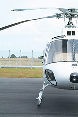 Image showing Half, white helicopter