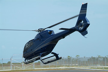 Image showing Dark blue helicopter