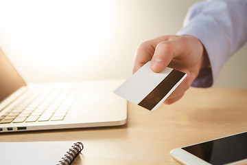 Image showing The man doing online shopping with credit card 