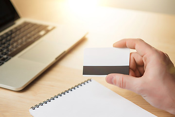 Image showing The man doing online shopping with credit card 