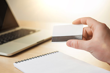 Image showing The man doing online shopping with credit card 