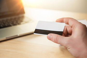 Image showing The man doing online shopping with credit card 