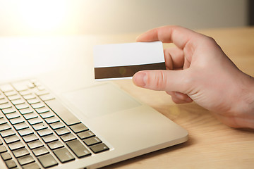 Image showing The man doing online shopping with credit card 